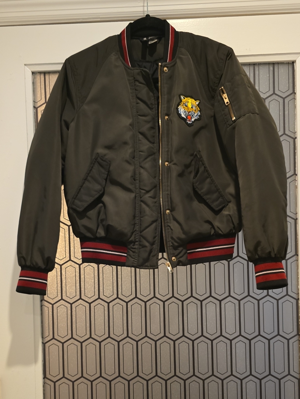 H&M Olive Green Bomber Jacket with Tiger Patch and Red-Striped Trim